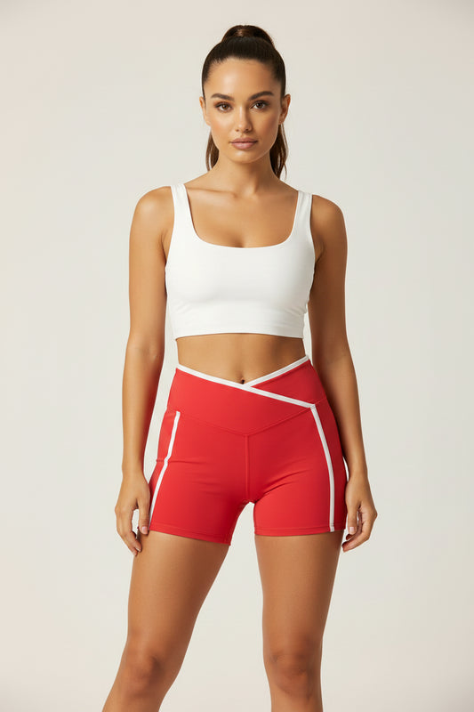 FORME IV high-rise color-block yoga shorts in Red, model view 1