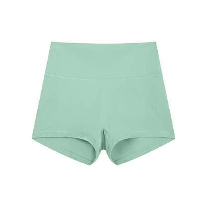 FORME IV high-waist yoga shorts in Green, front flat lay